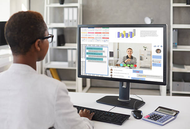 istock Woman working on office computer and communicating in work chat and via video calls 2226519329