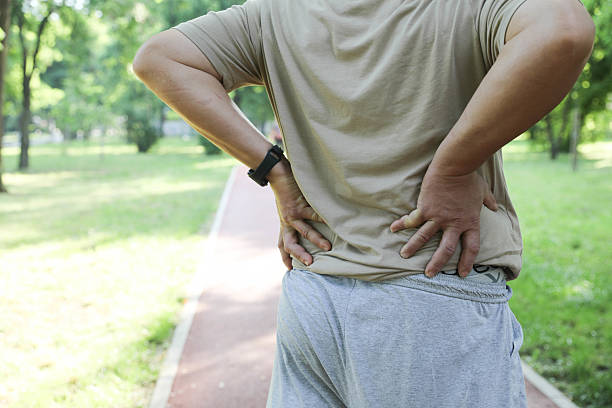 istock Elderly Man Feeling Strain in Lower Back After Exercise 2226522536