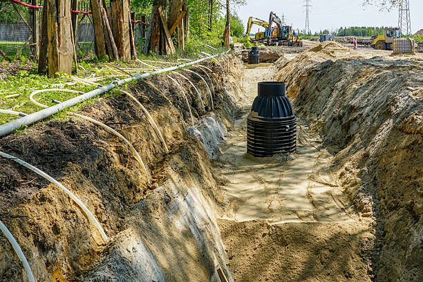 istock Trench dewatering System Installation with plastic and metal Pipes on Construction Site 2226522590