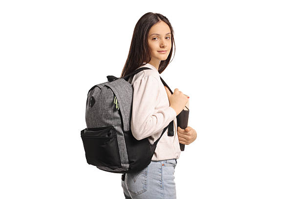 istock Female teenage student with a backpack and book 2226524860