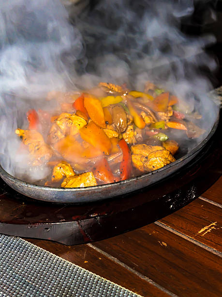 istock Steaming chicken sizzler with vegetables, Ella, Sri Lanka 2226527342