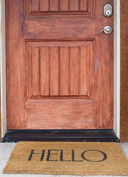 istock Hello welcome mat against rustic door in the Ozarks 2226530223