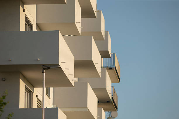 istock A building with balconies against a blue sky backdrop 2226530309