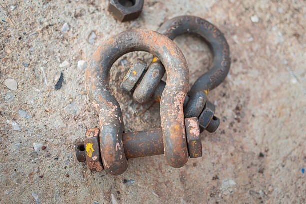 Iron steel shackles, heavy lifting equipment. Industrial object photo.