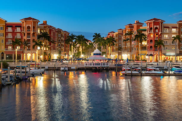 istock The charming waterfront of Naples, Florida, showcasing its beautiful architecture, bustling marina, and vibrant evening lights. 2226533028