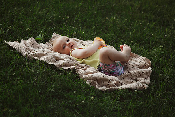 istock Baby Girl in Grass 2226533139