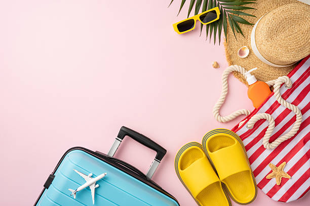 istock Packing for a sunny beach getaway with essentials like a suitcase, sandals, and accessories 2226536905