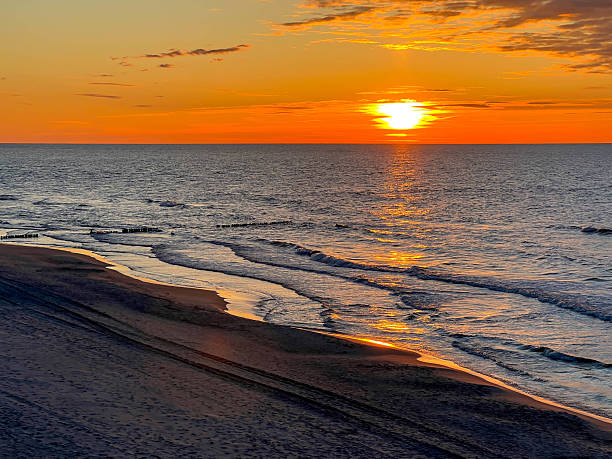 istock May sunset on the Baltic beach in Mrzezyno, Poland 2226537746