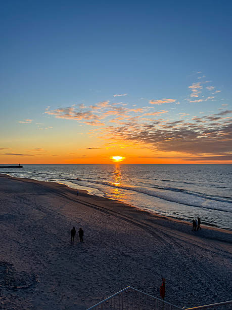 istock May sunset on the Baltic beach in Mrzezyno, Poland 2226537753