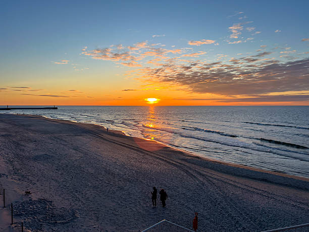 istock May sunset on the Baltic beach in Mrzezyno, Poland 2226537760