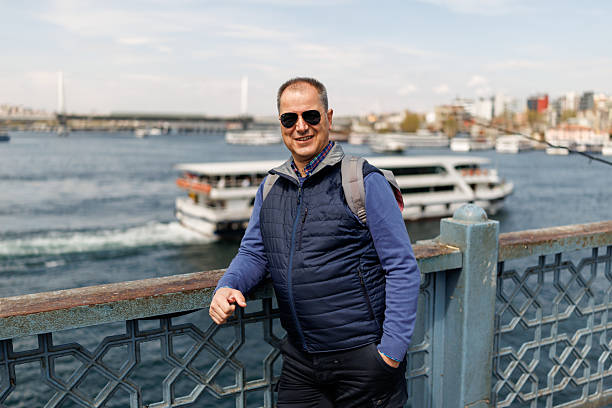 istock Mature man enjoying view on Istanbul from Galata bridge 2226537948
