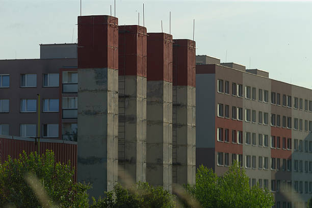 istock A large windowed building surrounded by trees in front of it 2226539114