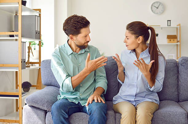 istock Angry unhappy family couple arguing on sofa, struggling with relationship problems, facing divorce. 2226542321