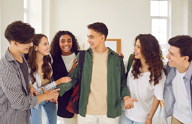 istock Happy Teenage Students Chatting During School Break 2226547024