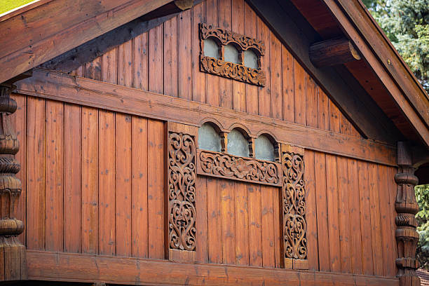Minot, ND, USA - July 06, 2025: A traditional Scandinavian house within Scandinavian Heritage Park with intricate Nordic ornaments