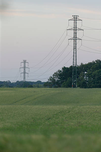 istock There are several power lines situated right in the middle of a field 2226558389