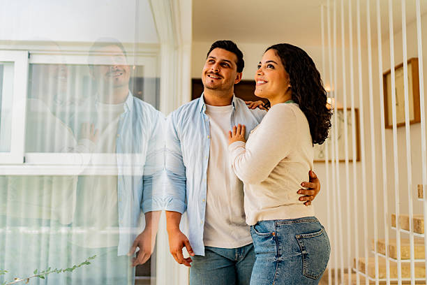 istock Couple contemplating at home 2226558427
