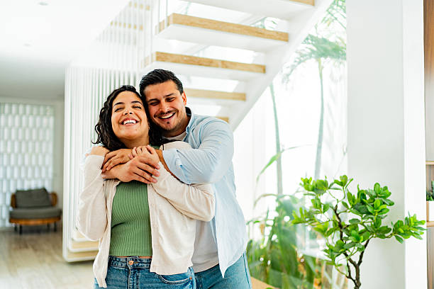 istock Couple celebrating embraced at home 2226558992