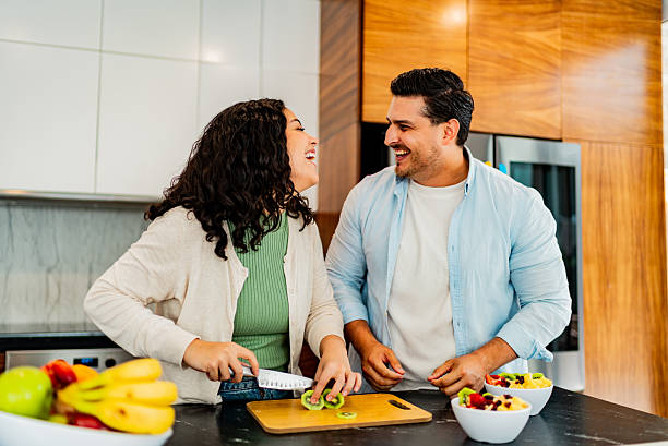 istock Couple preparing a fruit salad at home 2226559024