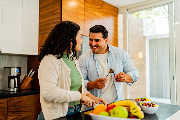 istock Couple preparing a fruit salad at home 2226559029