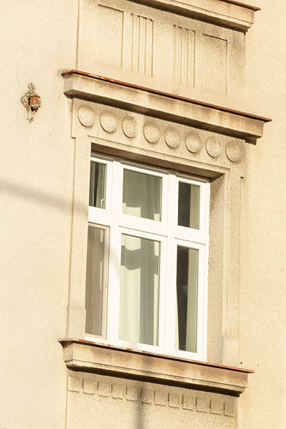 istock There is a window located on the side of a building featuring a white frame 2226560155