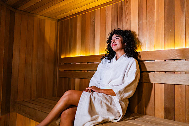 istock Young woman relaxing on sauna 2226560272