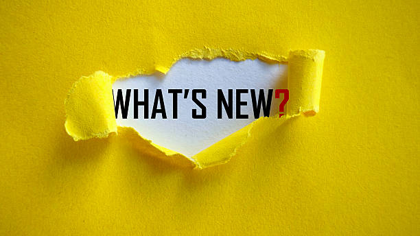 istock What's New? Message Revealed Under Ripped Yellow Paper 2226562407