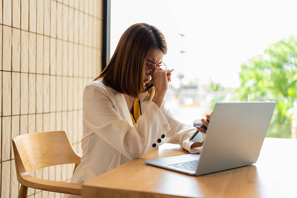 istock Stress businesswoman is sitting at table, under stress from working. 2226563504