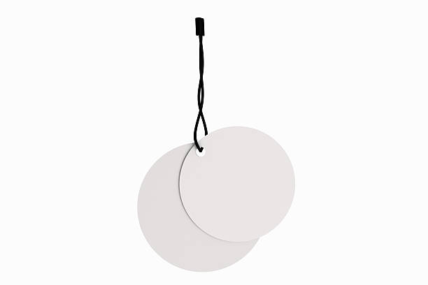 istock 3D blank circle cardboard paper hang tags, price tags or cloth labels mockup with string isolated on background. Tag realistic template for presents branding, shopping label, wedding tag, gift tag 2226564667