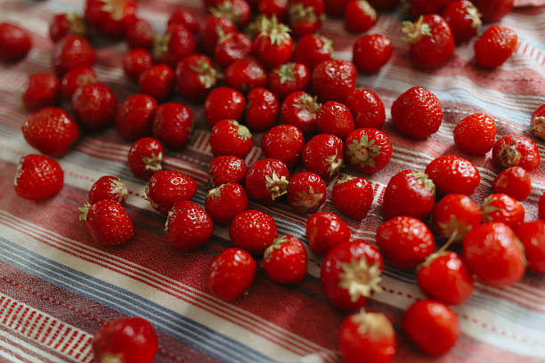 red strawberries on a plate and a healthy strawberry cocktail. Healthy vitamin breakfast