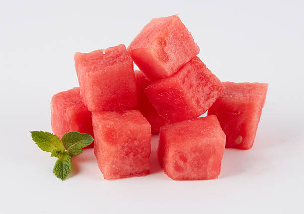 istock watermelon cut into cubes isolated nature background with clipping path 2226568731