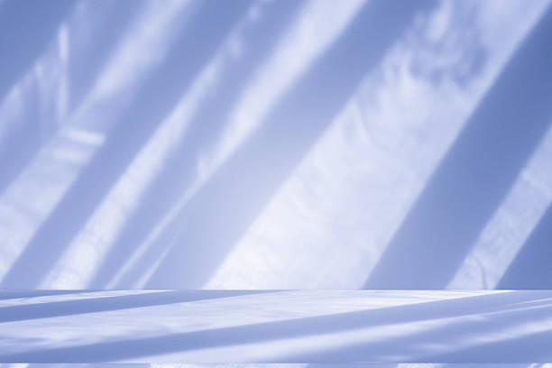 istock Studio style background wall decoration presentation uses white and blue tones. with shadows cast from a nearby window, concept creating a decorative 2226578984