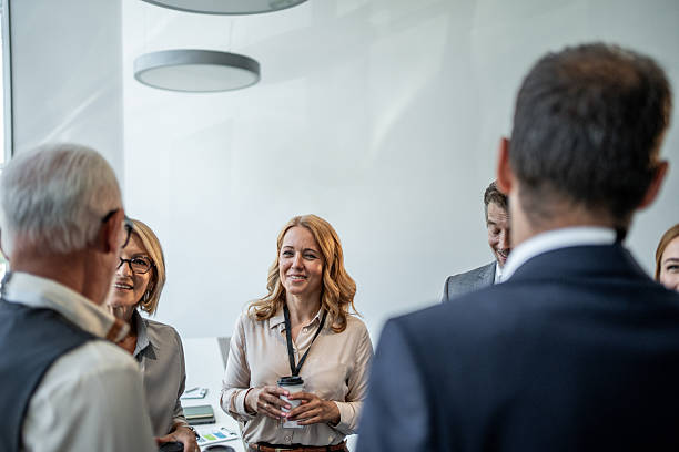 istock Business people talking during coffee break at schneider electric office 2226579415