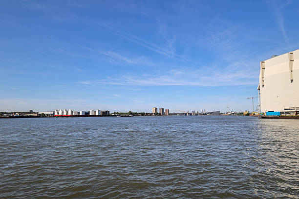 River Lek with all kinds of shipping dock yards close to Rotterdam