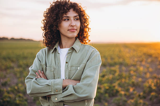 istock Young agronomist enjoying the sunset over soybean field 2226588298