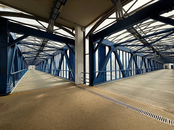istock Pedestrian Bridge Split Above Highway. City Infrastructure Theme. Manual Mobile Photo, Shallow Depth of Field, Not AI Generated 2226591173