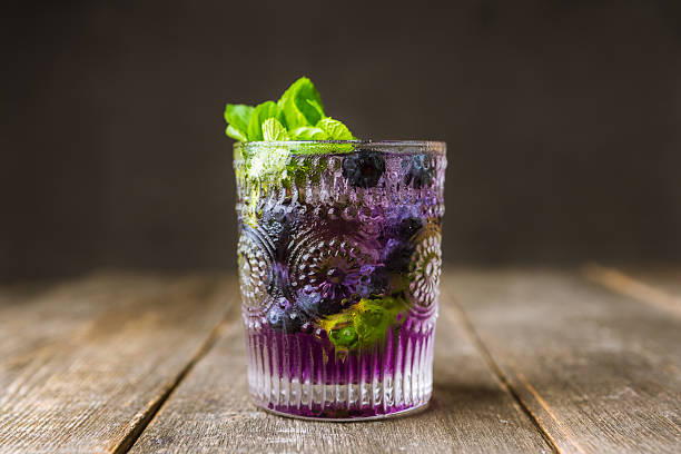 istock Blueberry mojito on the rustic wooden background 2226602242