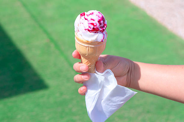 Delightful ice cream cone in the hand