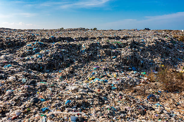 istock Massive Landfill Under Blue Sky: Environmental Waste Crisis 2226605617
