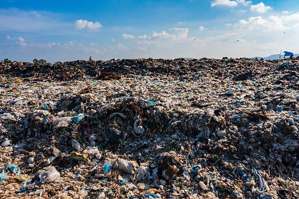istock Massive Landfill Under Blue Sky: Environmental Waste Crisis 2226605674