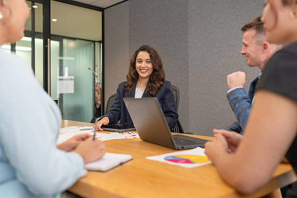 istock Female Leader Engaging with Her Team 2226606144