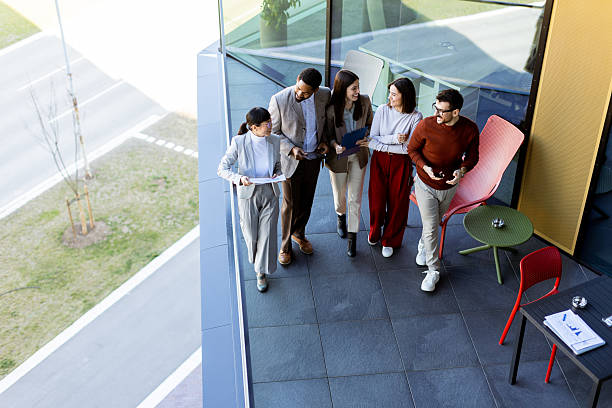 istock Team brainstorming and collaboration on a terrace during a sunny afternoon in a modern setting 2226608569