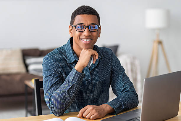 istock Confident young professional smiling at desk 2226609317