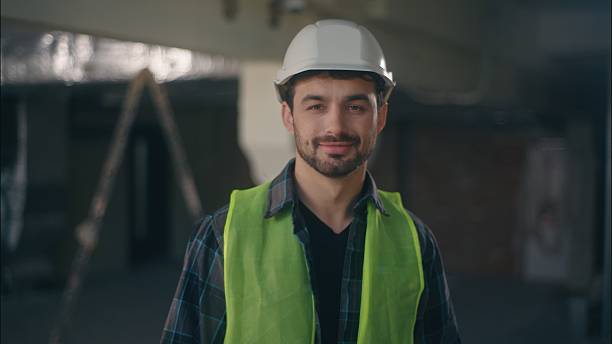 istock Caucasian builder man smiling looking at camera guy portrait male happy worker contractor in helmet engineer architect workman building industry construction foreman repairman professional inspector 2226611998