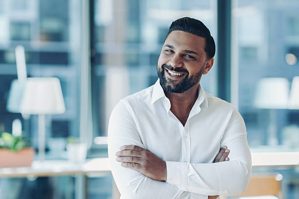 istock Smiling young businessman wearing white shirt 2226613075