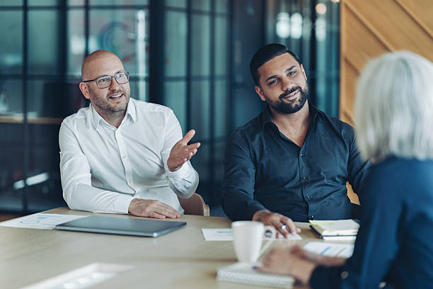 istock Group of entrepreneurs having a discussion 2226613080
