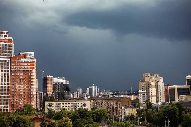 istock City and blue clouds before rain 2226614744