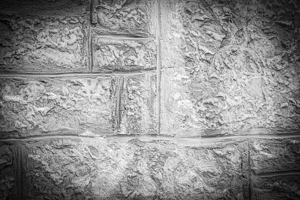 Close-Up of a Textured Stone Wall with Light and Neutral Tones