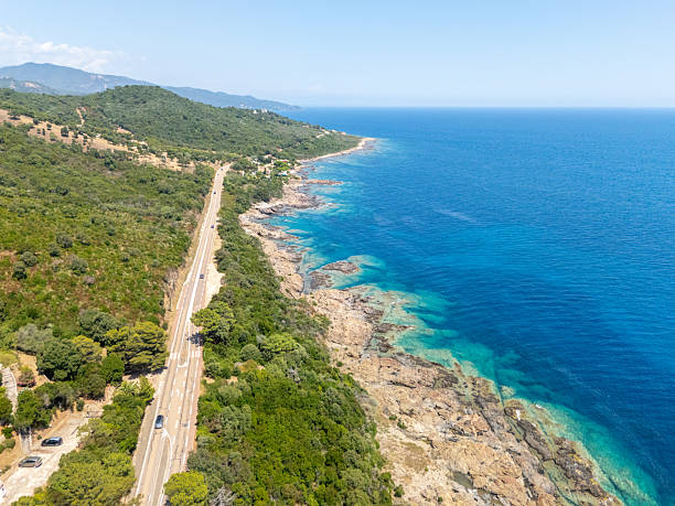 istock Coastal Road Along Rocky Mediterranean Shoreline 2226620647