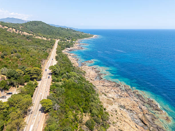 istock Coastal Road Along Rocky Mediterranean Shoreline 2226620828